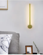Minimalist Linear LED Wall Sconce – Rvrix – Sword Style, Gold Finish, Bedside Lifestyle