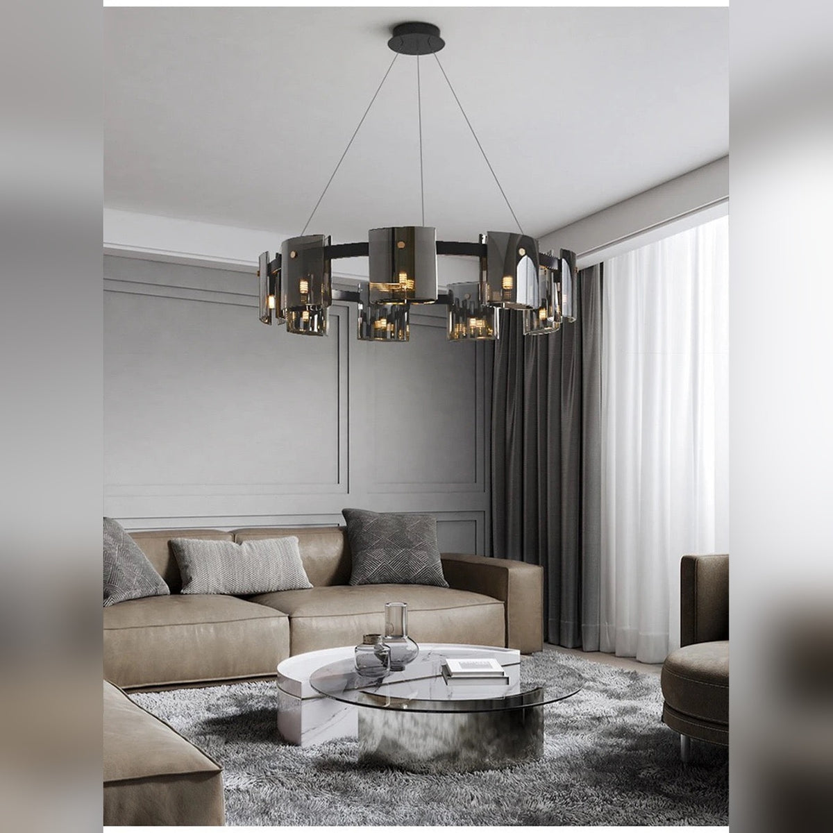 Kelrix chandelier in Smoke Grey glass above a living room dining table