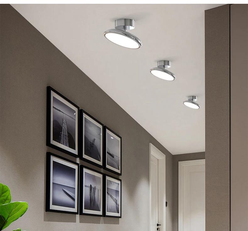 Velmora rotating disc ceiling light in mirror chrome, hallway lifestyle view