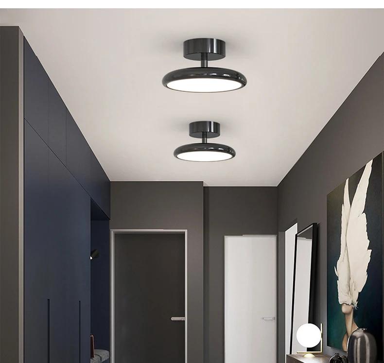 Velmora ceiling light in glossy Pearl Black, hallway lifestyle view