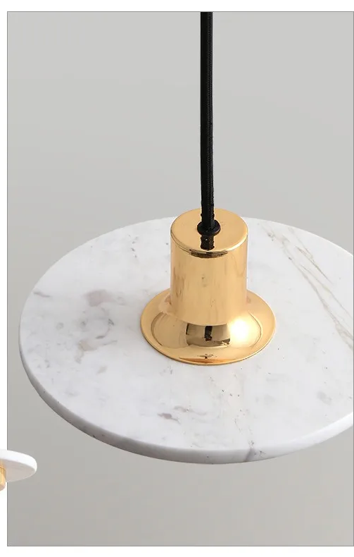 Raelith White Marble disc detail with brass fitting