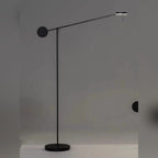 Bilancio floor lamp full silhouette showing counterweight and pivoting arm