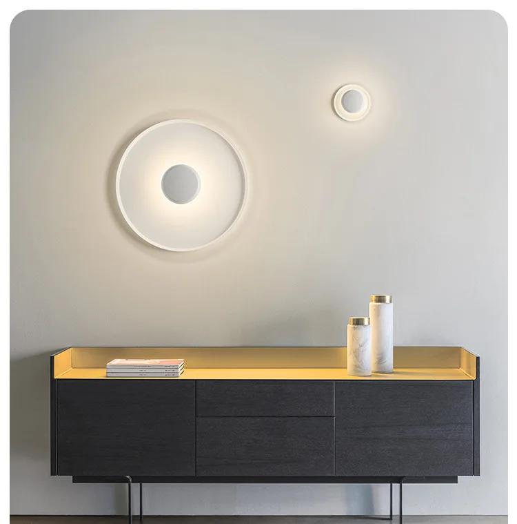 Xelion wall-mounted in two sizes above a console