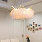 Jevon white feather halo chandelier — dining entryway lifestyle view above white door