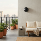 Multi-Beam Aluminum Sphere Wall Sconce Triberon – Black finish, daytime balcony lifestyle