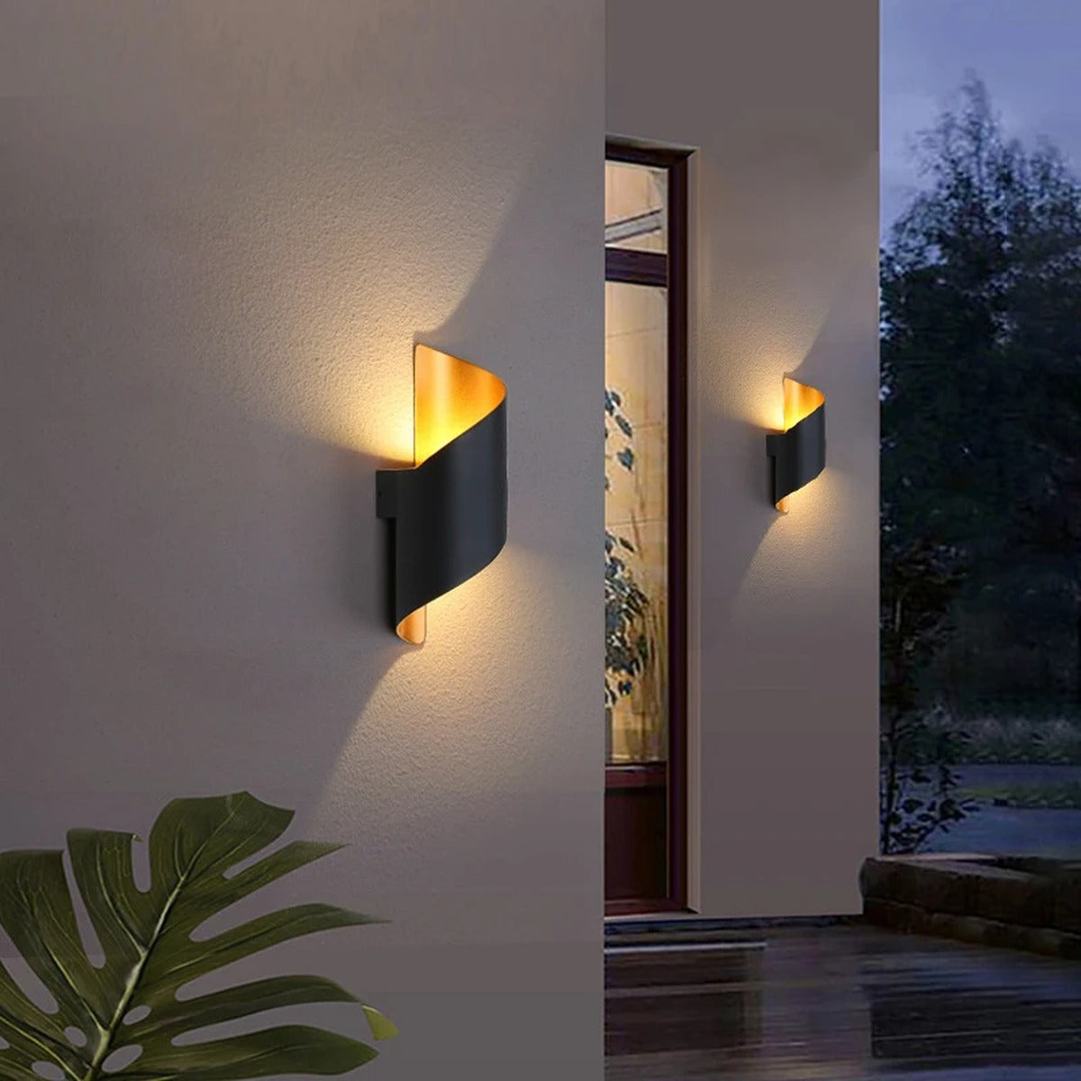 Cendrix spiral wall light — lifestyle, entrance at night