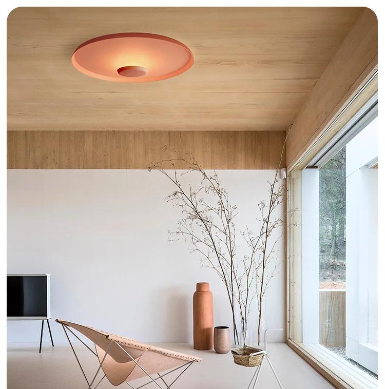 Xelion terracotta red ceiling light in a living room
