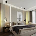 Uyaelinth adjustable-angle cone pendant — bedside lifestyle
