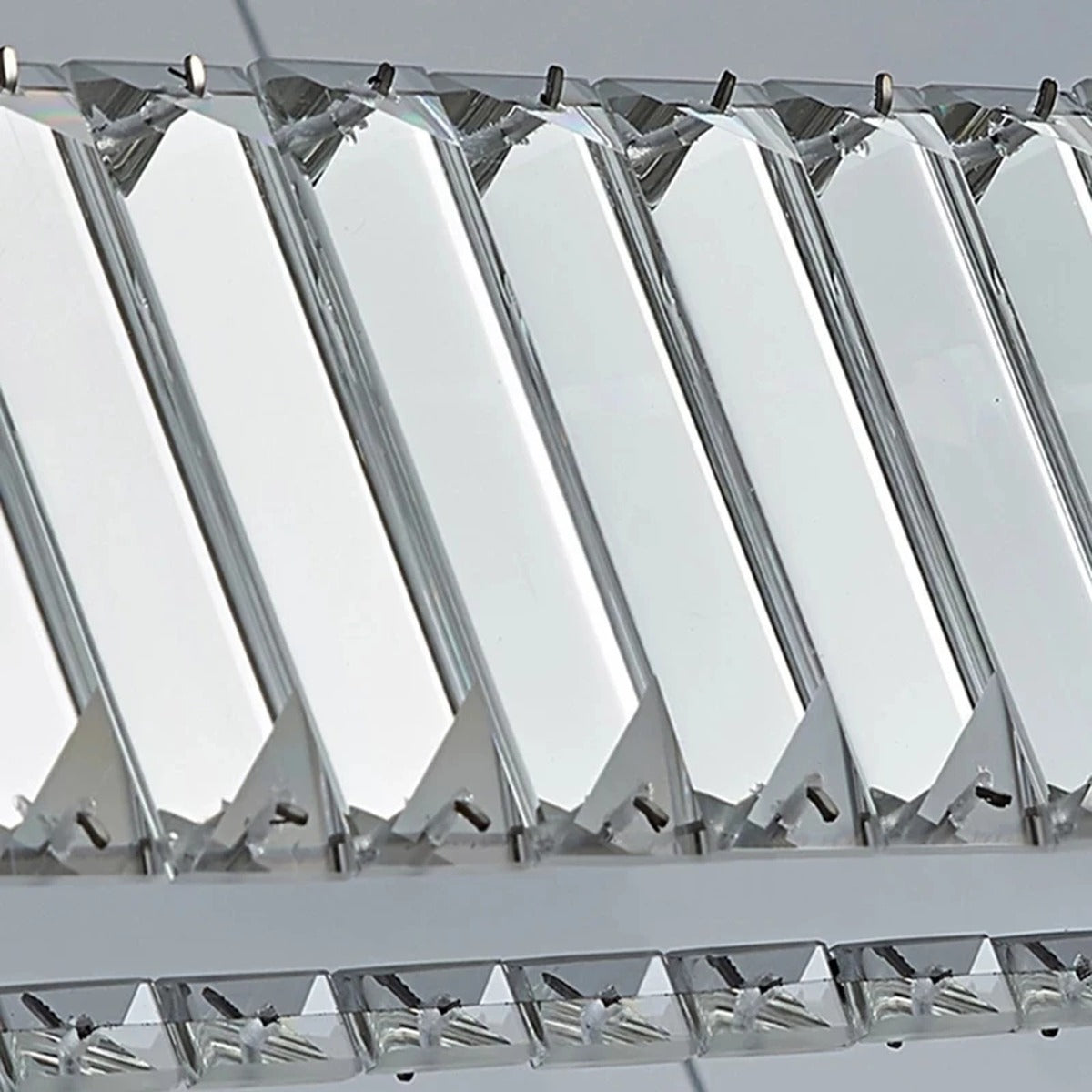 Serpentine Crystal Linear Chandelier Oevanthos — crystal facet detail