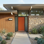 Barienth Outdoor Wall Light illuminating a modern wood-clad entrance
