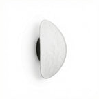 Tenzora wall sconce side profile, Black backplate, studio view