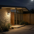Barienth Outdoor Wall Light on a stone facade at dusk