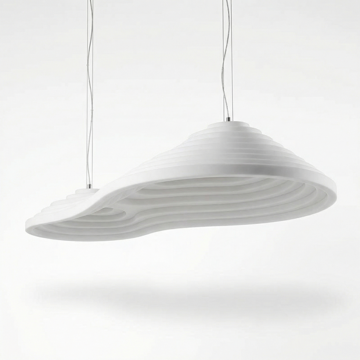 Sculptural Ribbed Wave Pendant Light Amberon – Lit Studio View