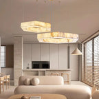 Orivex hexagonal alabaster pendants, shown as a duo, over a kitchen island