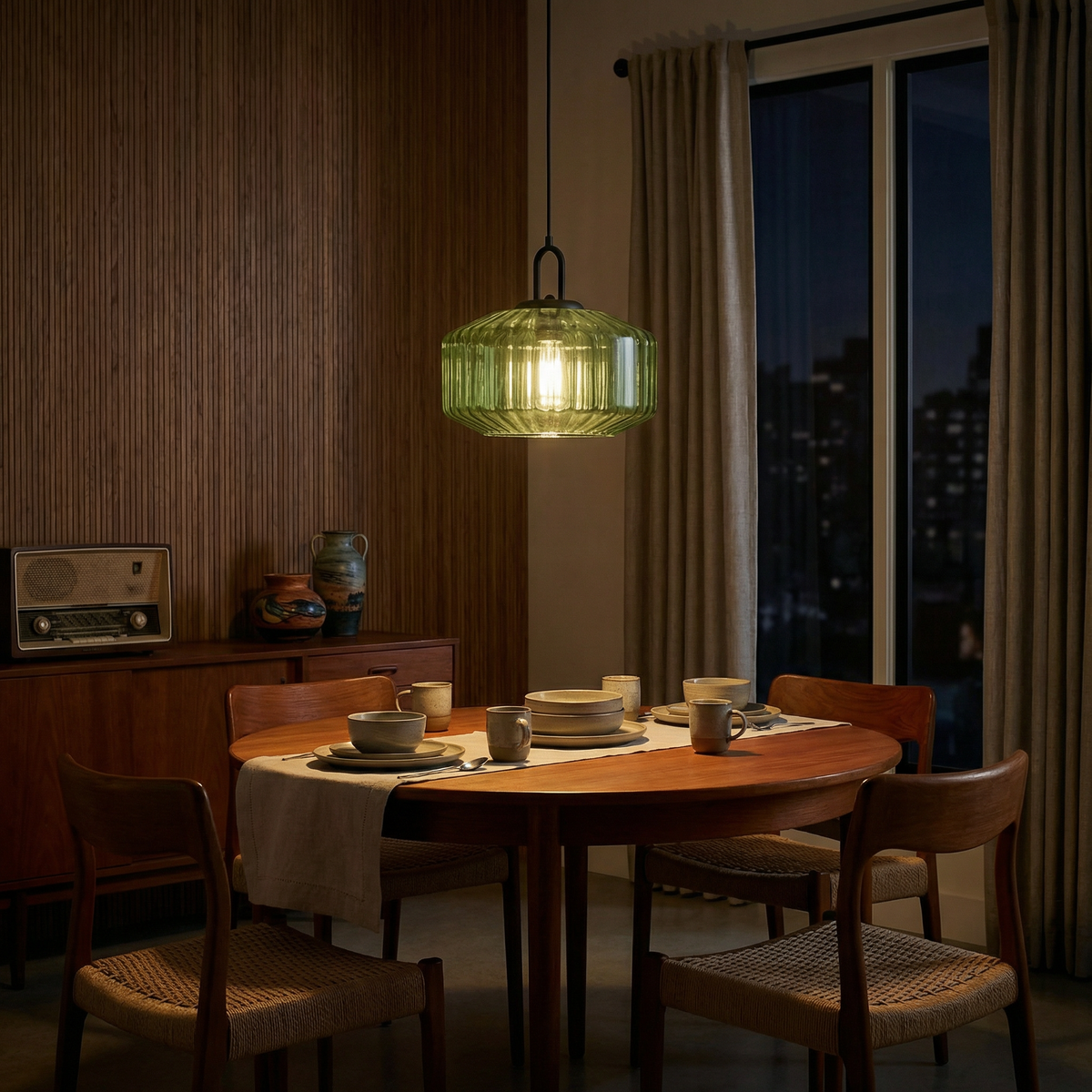 Green ribbed blown glass pendant light Rivenex, evening dining scene