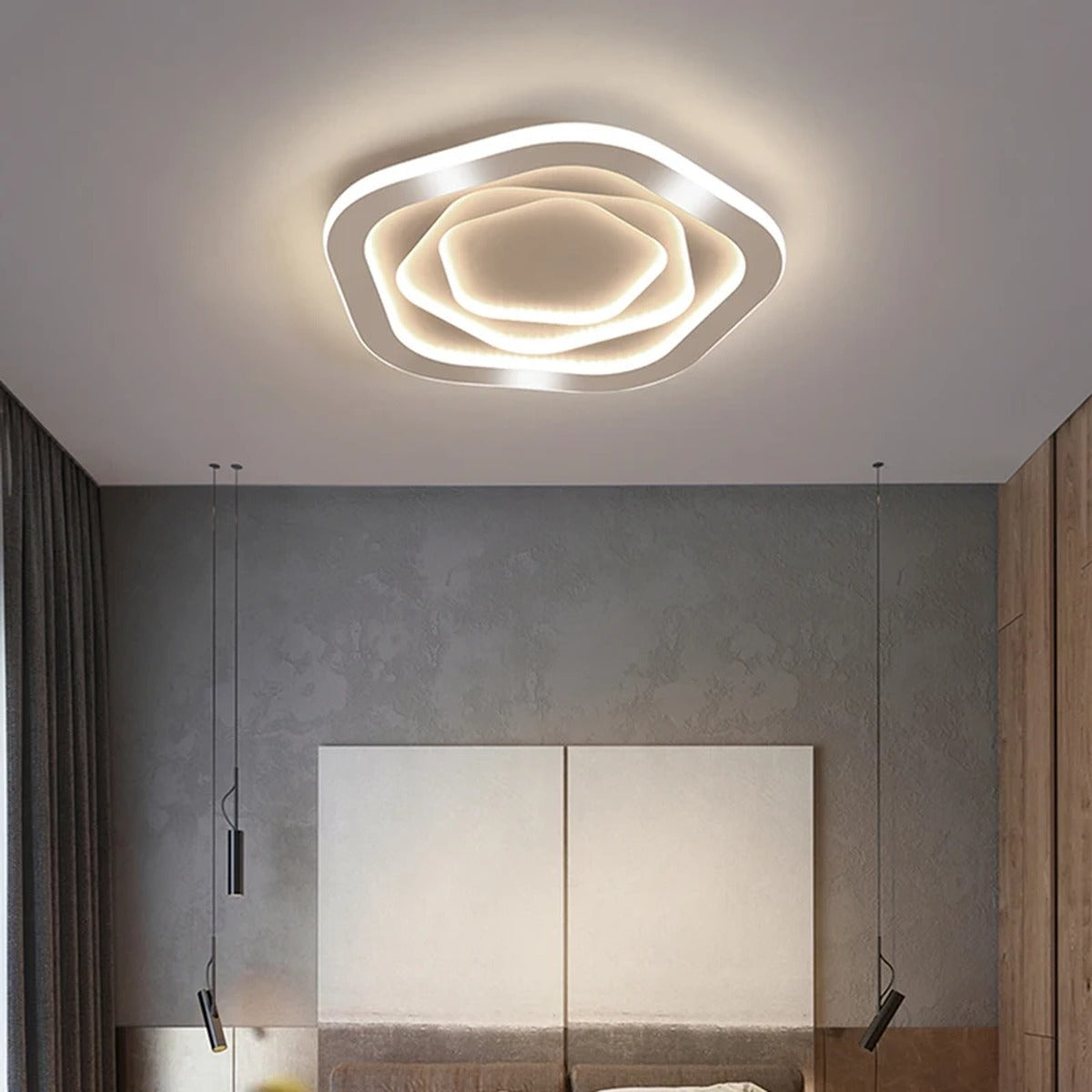Layered Facet Flush Mount Ceiling Light – Faelora, white finish above a bed
