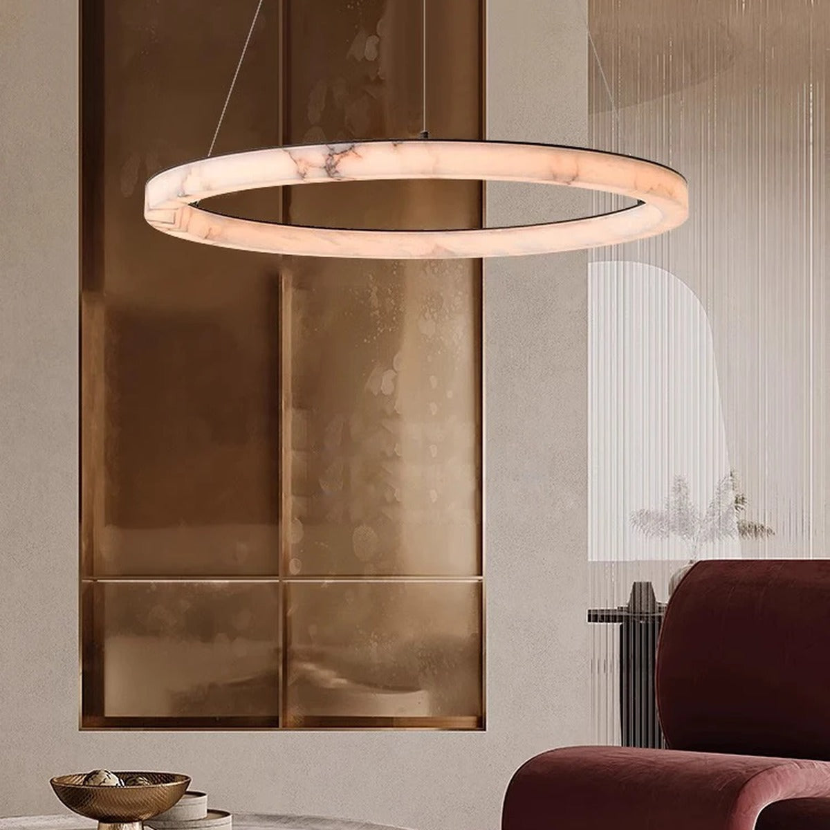 Selion marble-effect ring pendant light — Ø80cm ring glowing warm ivory in a luxury living room