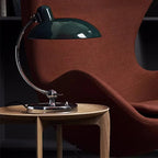 Bauhaus Dome Arc Desk Lamp - Zarlux - Lifestyle, Forest Green on Side Table