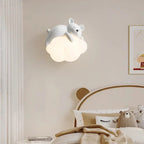 Softholm bear on cloud wall sconce - lifestyle view above bed
