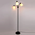 Merelix floor lamp lit with warm white E27 bulbs
