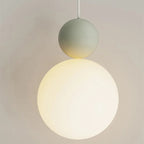Luniva pendant light — close-up of opal globe and colour cap