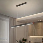 Linexa Black LED Bar Pendant Light above a wood kitchen island