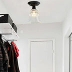 Nostrum vintage ribbed glass dome ceiling light — clear ribbed dome on black Victorian fitting in white minimalist hallway