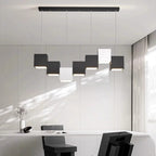 Evrixon cluster pendant — individual cable suspension detail, staggered heights