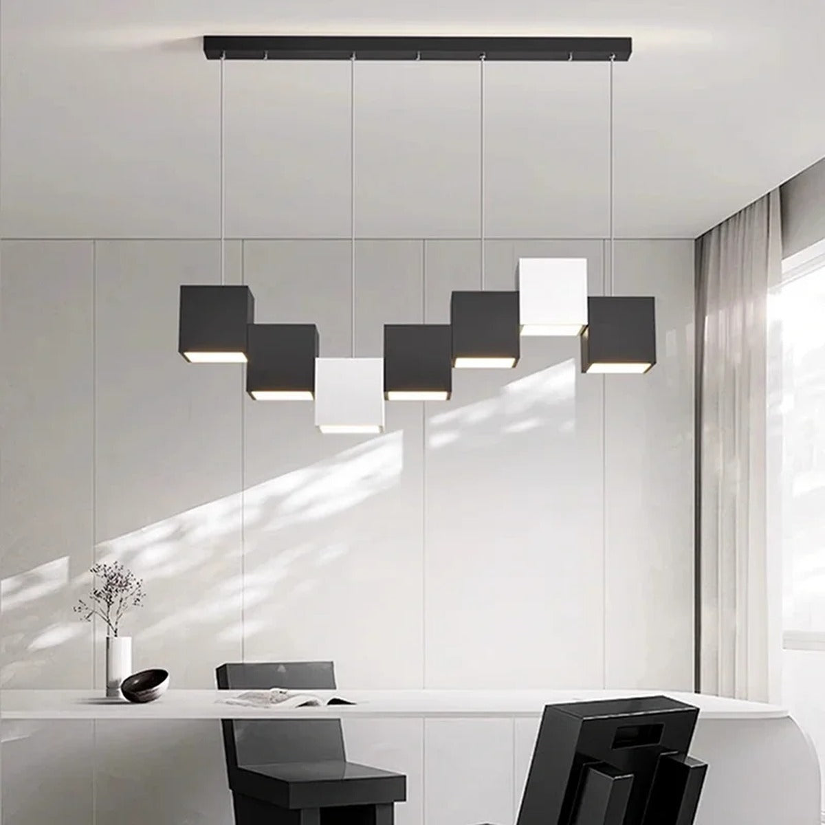 Evrixon cluster pendant — individual cable suspension detail, staggered heights