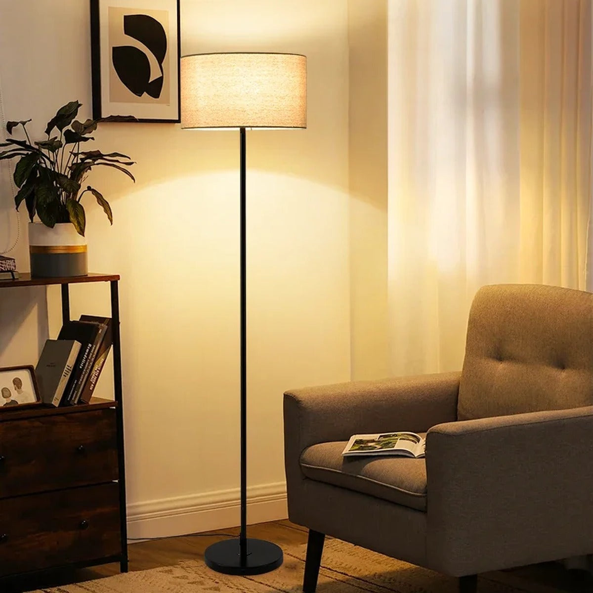 Silent floor lamp — close-up of brass-and-black stem detail
