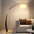 Modern Black & Gold Arc Floor Lamp – Renaith – Lifestyle Hero Shot