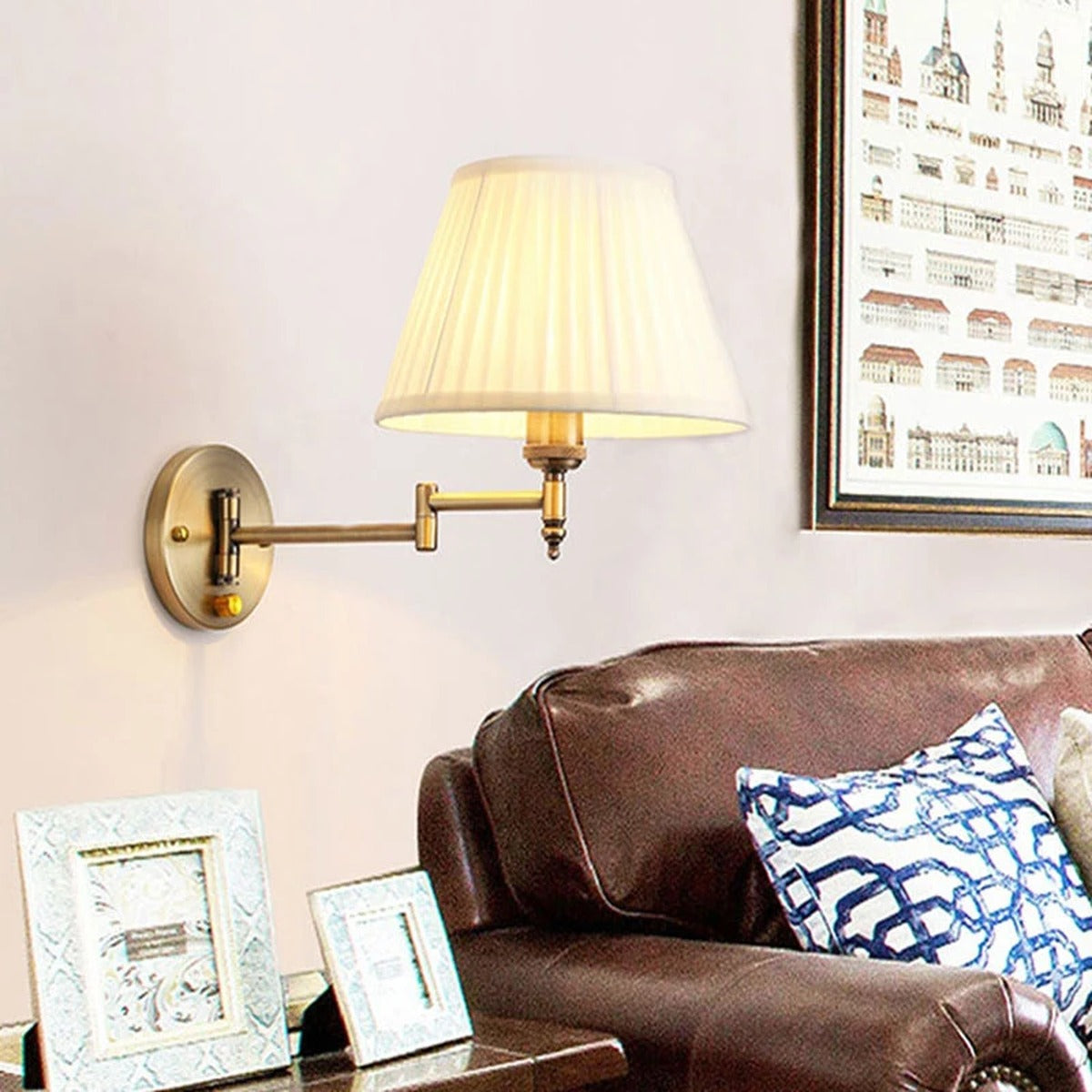 Brass Swing-Arm Pleated Shade Wall Sconce – Thelorn – Lifestyle in a living room