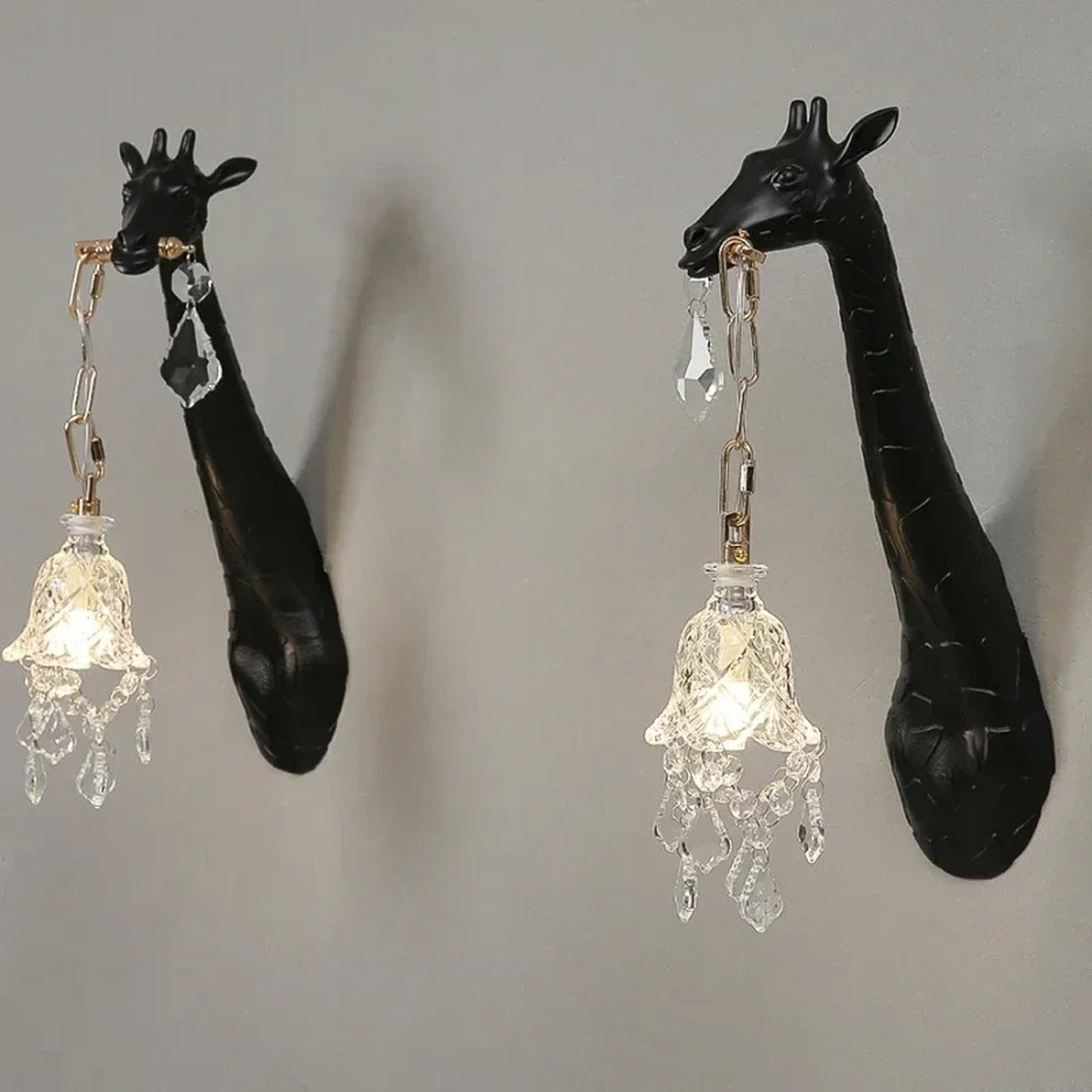 Serengeti giraffe wall sconce, black finish, facing pair — studio