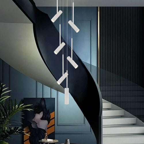 Solerno adjustable multi-head spot pendant — lifestyle, staircase installation