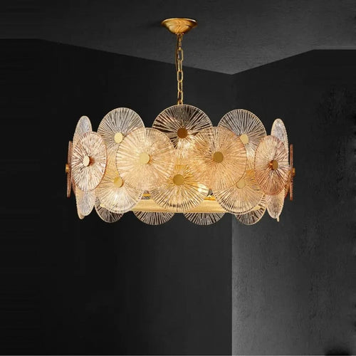 Iralux glass disc drum chandelier in a contemporary living room corner