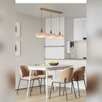 Uuaelvix wood and glass pebble pendant light, Milk White three-shade linear over dining table