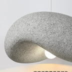 Zenaro — dusty pink version from below showing organic aperture form