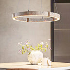 Quarren stone pendant — close-up of travertine natural veining glowing warm white