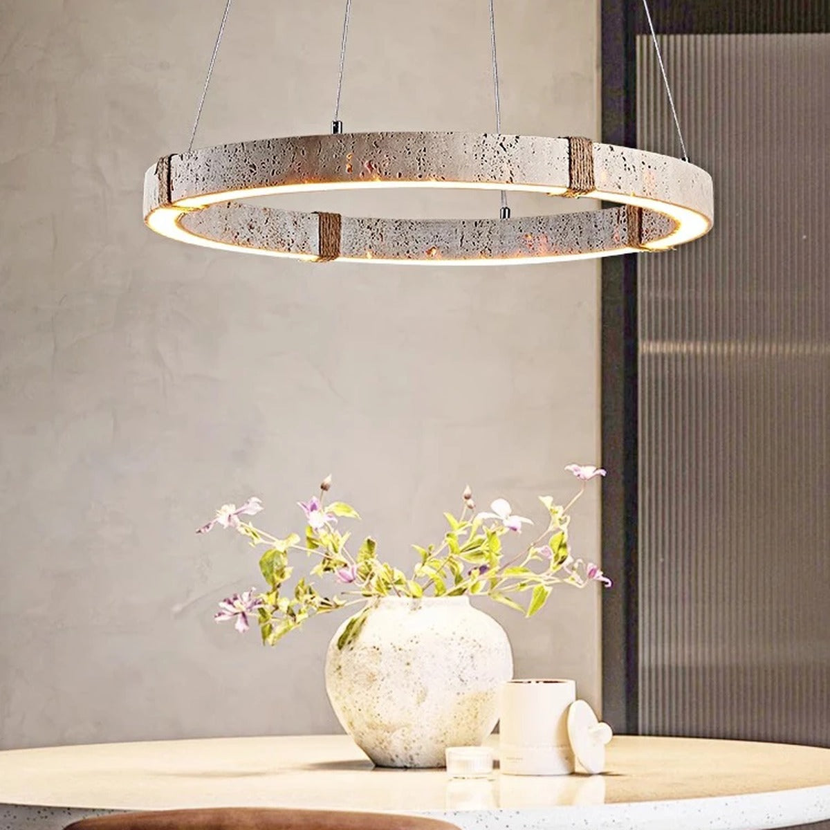 Quarren stone pendant — close-up of travertine natural veining glowing warm white