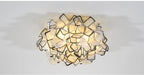 Lumero chandelier, black-edge acrylic petals, illuminated