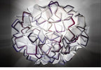 Lumero chandelier, purple-edge acrylic petals, illuminated