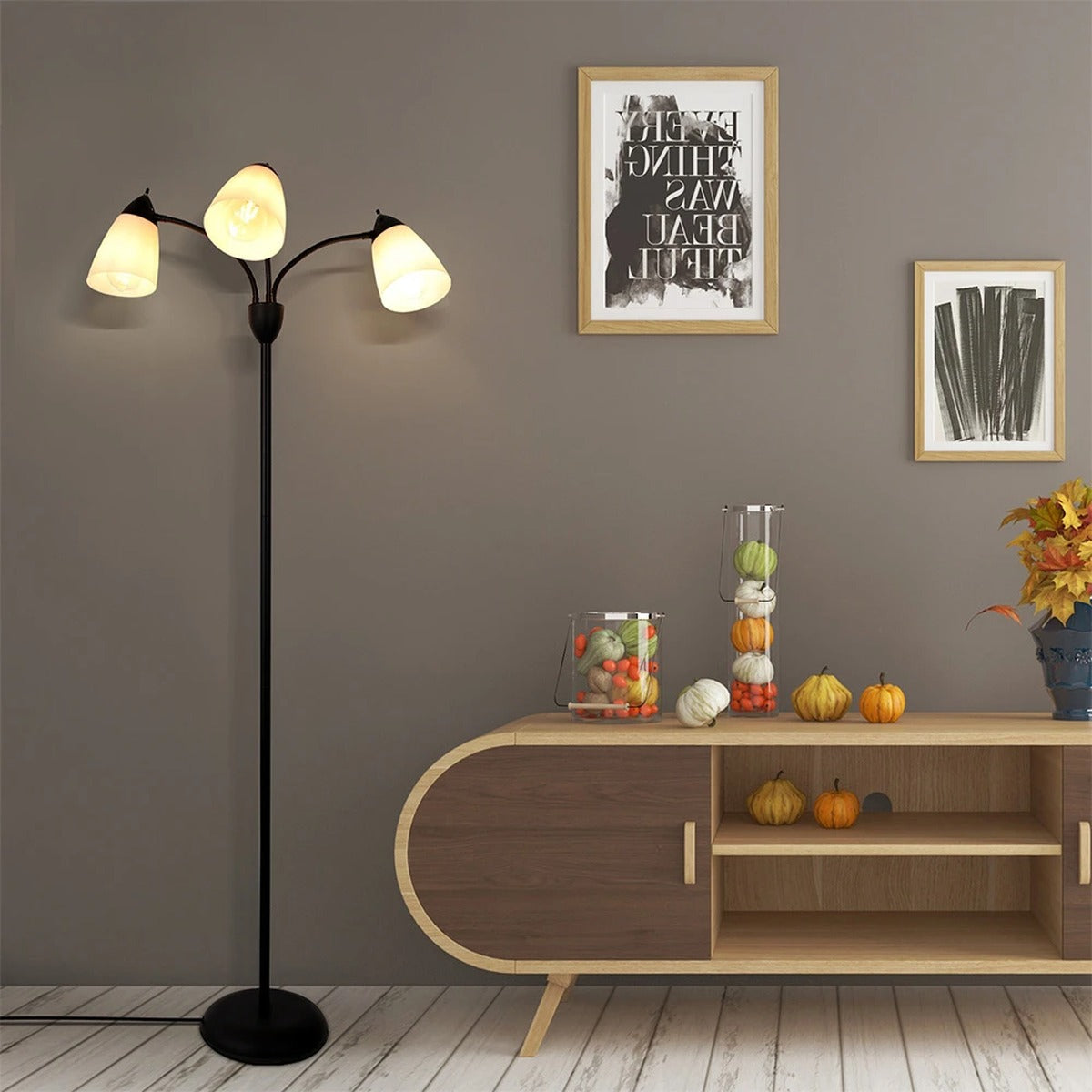 Merelix black 3-arm adjustable floor lamp in a living room setting