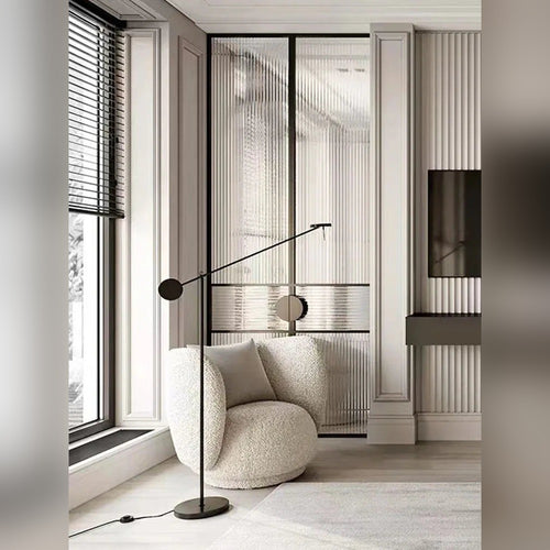 Bilancio counterbalance floor lamp in a contemporary living room corner