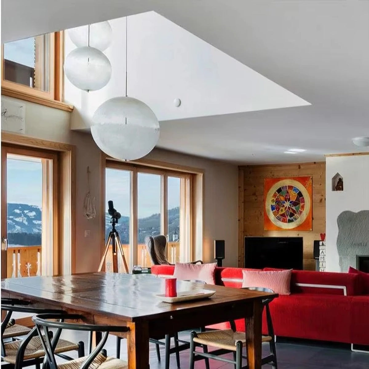 Lunaro Moon Chandelier above a dining table
