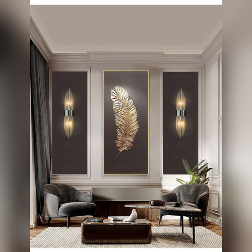 Pair of Aurelix crystal rod wall sconces in matte black flanking artwork