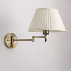 Brass Swing-Arm Pleated Shade Wall Sconce – Thelorn – Front view