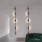Moon Disc Vertical Pole Wall Sconce – Jevanto – Hero Shot
