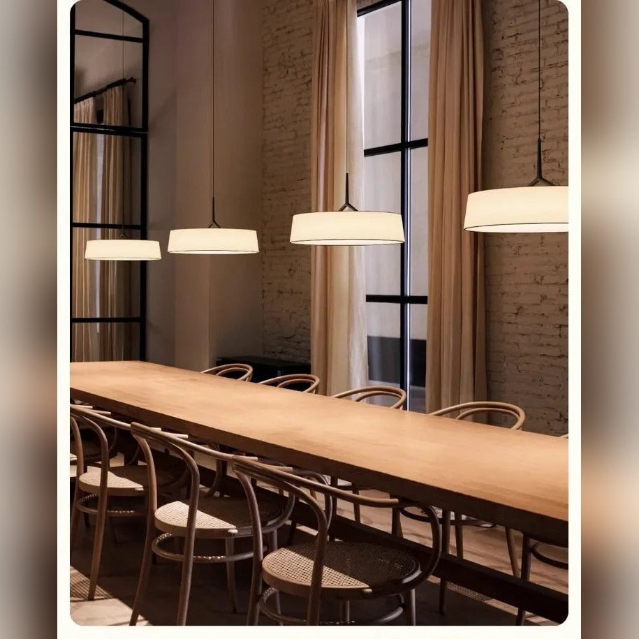 Slender Stem Flat Drum Pendant Light – Walvorn – row of pendants above a dining table