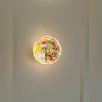 Orbinth wall sconce mounted at a ceiling corner, warm glow