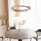 Quarren pendant — side profile showing stone bar texture and black cable suspension